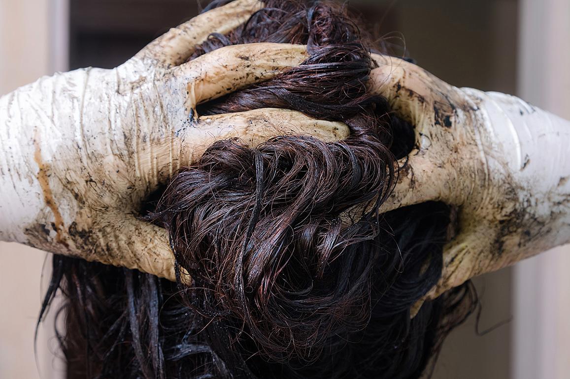 Woman dyeing her hair