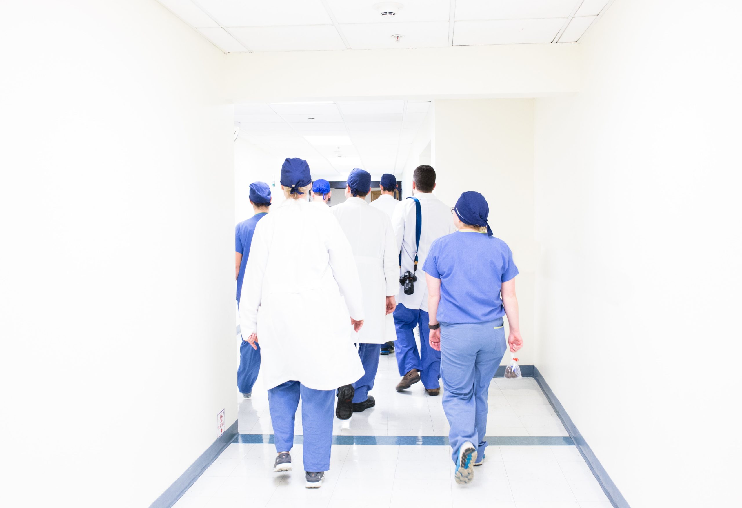 Doctors Walking Down a Hall
