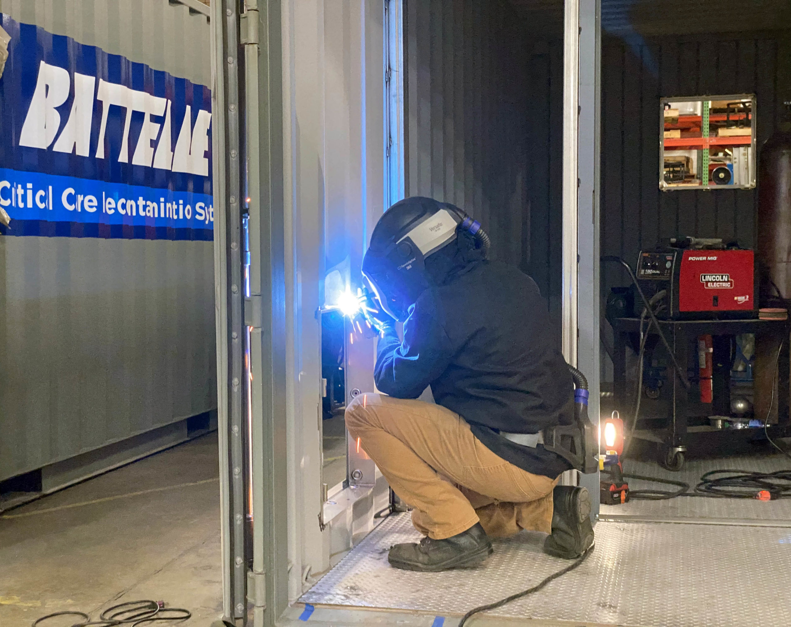 welder constructing Battelle CCDS chamber